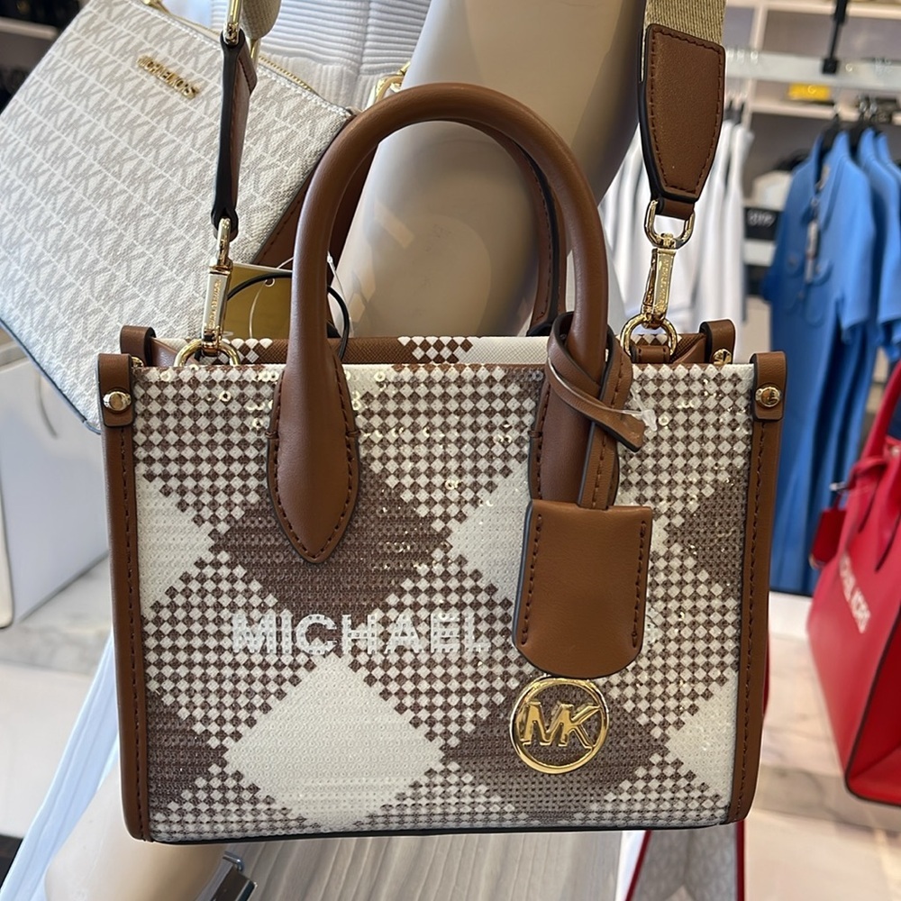 Michael Kors Mirella Extra-Small Logo Crossbody XBODY Shopper Bag
Luggage
NWT - Picture 14 of 16